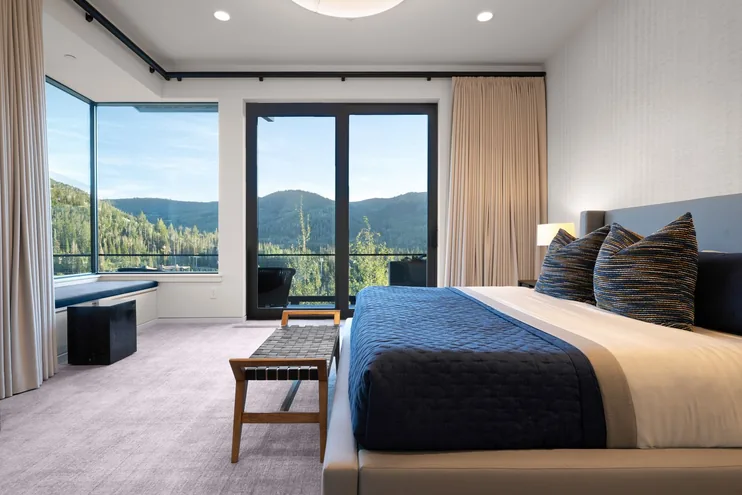 Guest suite with mountain views and a private terrace door